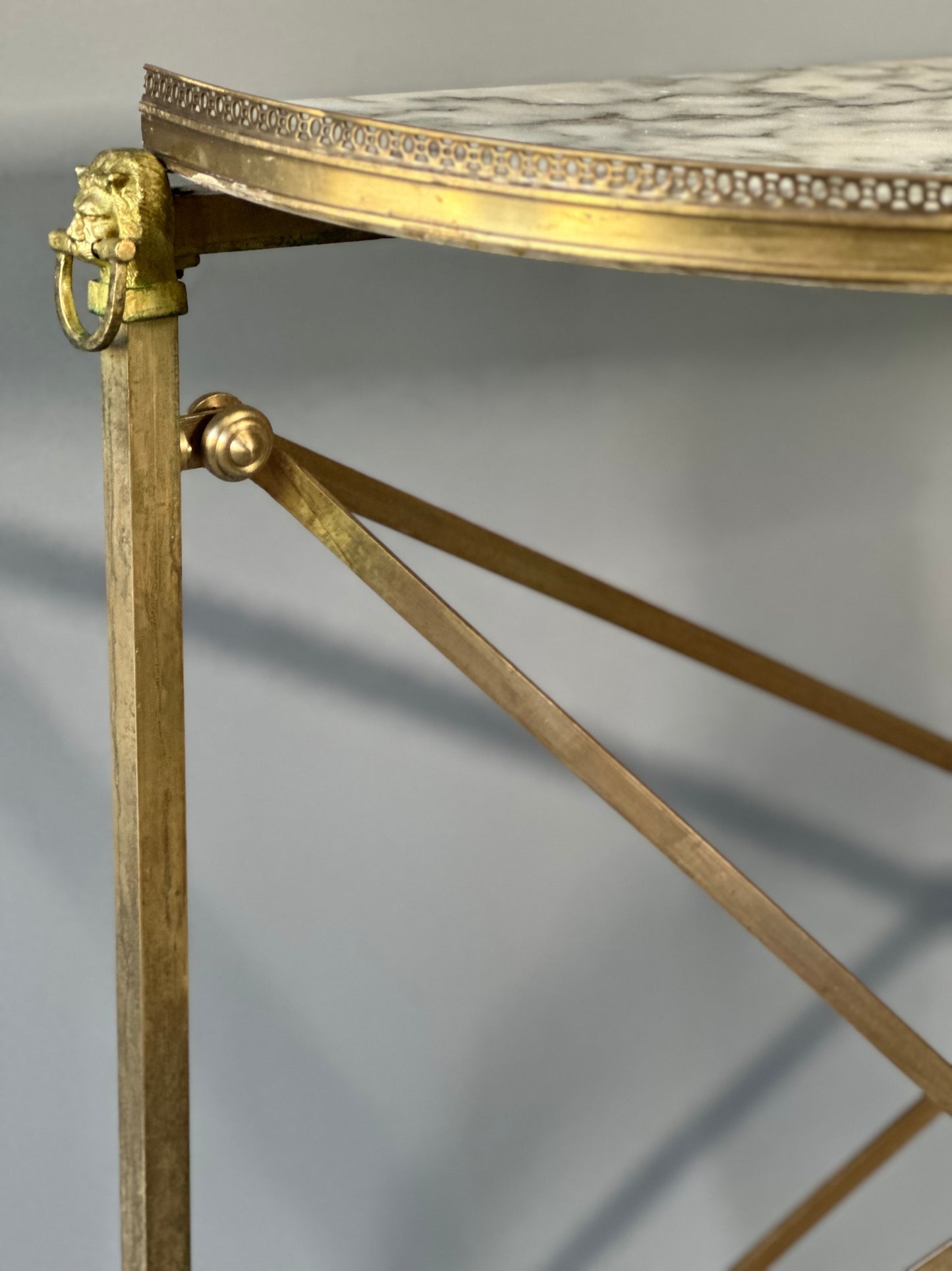 SOLD **Spanish Marble and Brass Lion Demi-Lune Console Tables